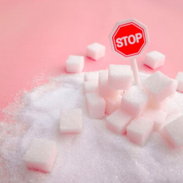 Stop sign on the sugar, warned that the sugar too much will make unhealthy nutrition, obesity, diabetes, dental care and much more.